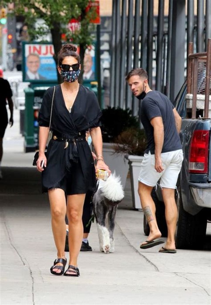Katie Holmes Proves She’s A Knockout In Black Mini Dress As Hunky Mystery Man Checks Her Out